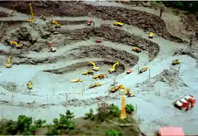 DEF Delete on site with Excavators in the background